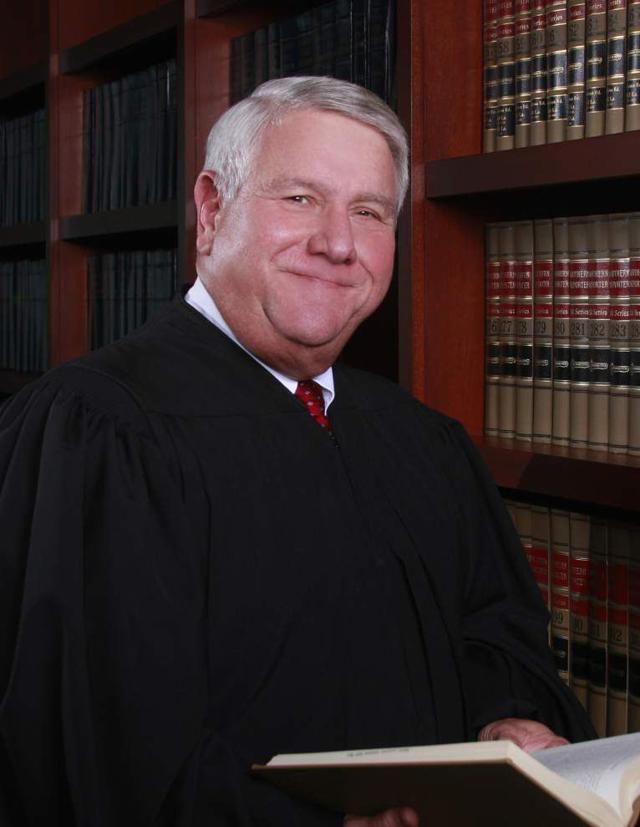 A fourth 19th Judicial District Court judge Mike Caldwell is retiring
