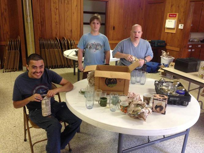 Options participants help with garage sale Communities