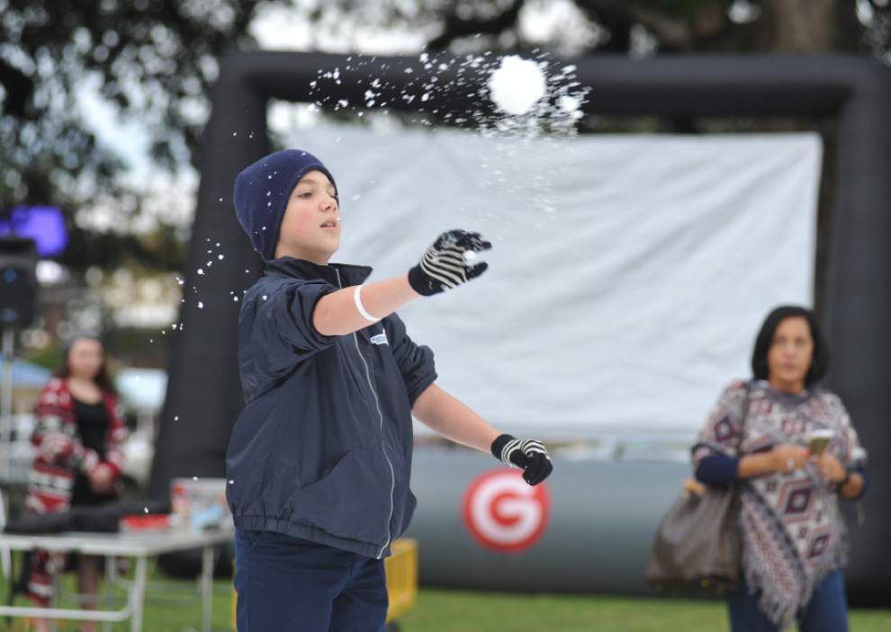 Photos: With some man-made help, annual Sneaux Day sees ice skating, snowballs _lowres