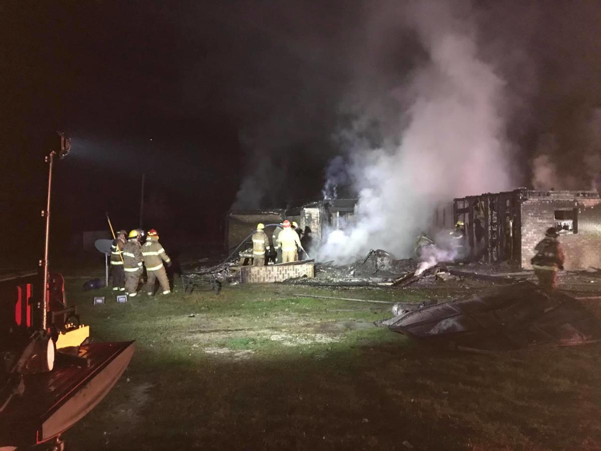 Photos Massive fire at Livingston home stops at Scriptures written on wall studs Livingston