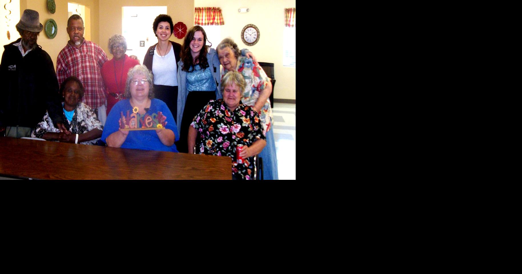 Assisi Heights Apartments holds feast and turkey give away St