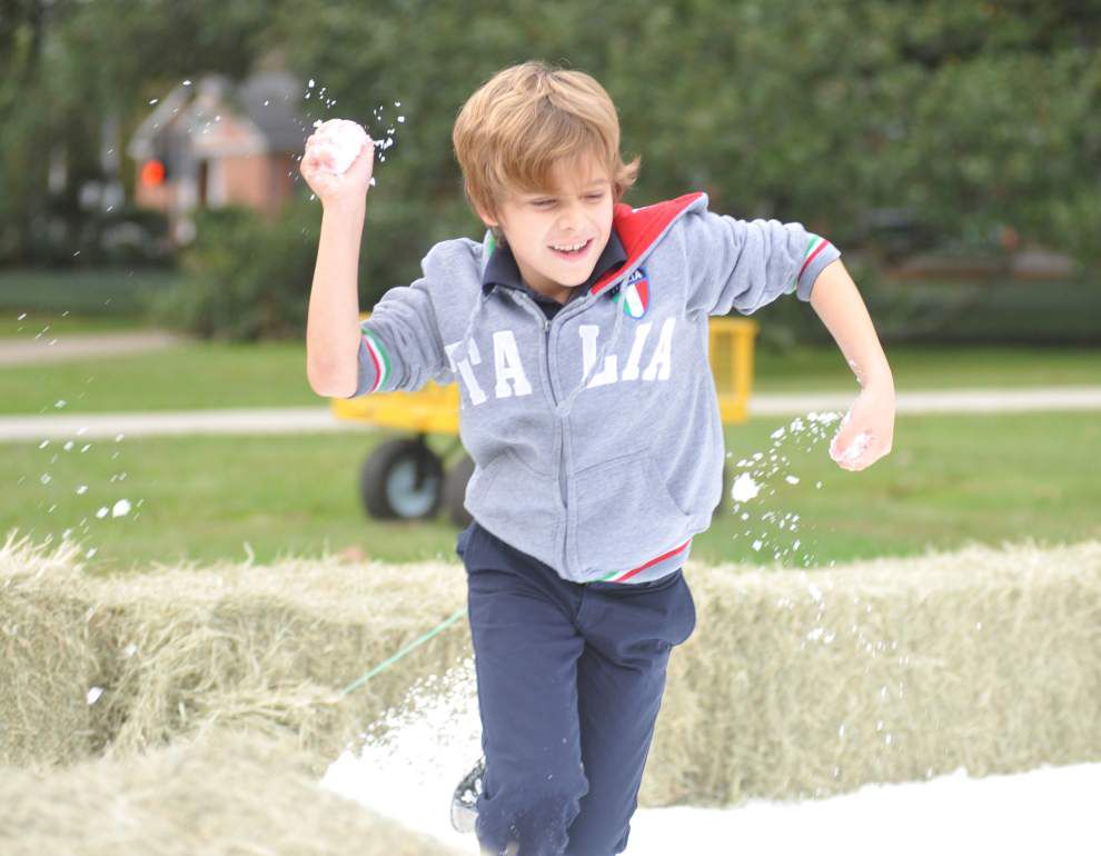 Photos: With some man-made help, annual Sneaux Day sees ice skating, snowballs _lowres