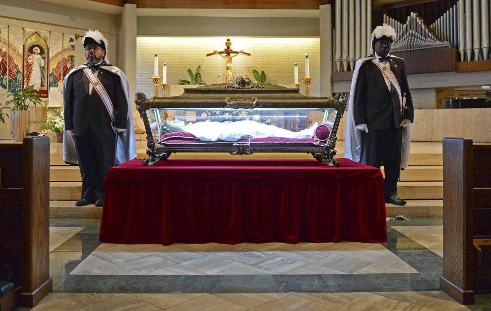 Photo: Baton Rouge faithful flock to see remains of youngest Catholic saint _lowres