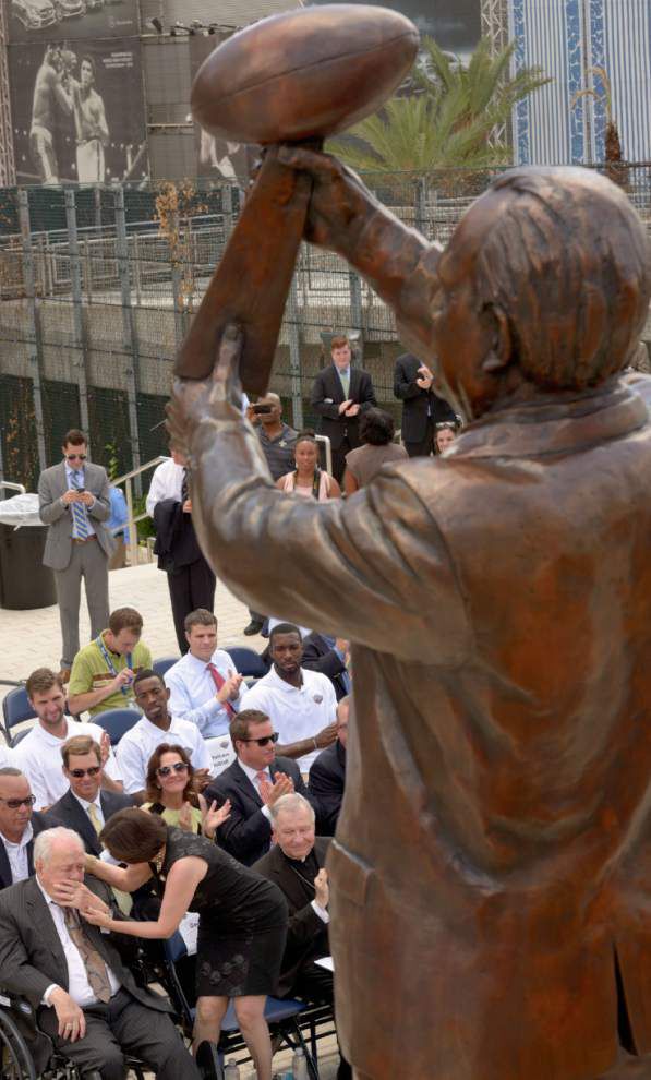 Saints unveil Tom Benson statue outside Superdome