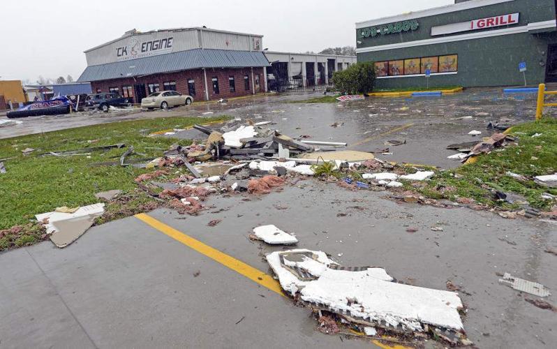 Cleanup begins along busy Ascension Parish corridor heavily damaged by