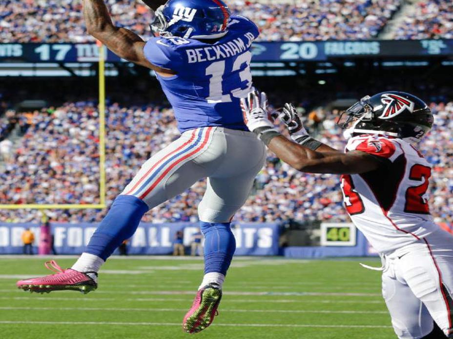 Odell Beckham Jr. catches passes from Eli Manning at Manning Camp 