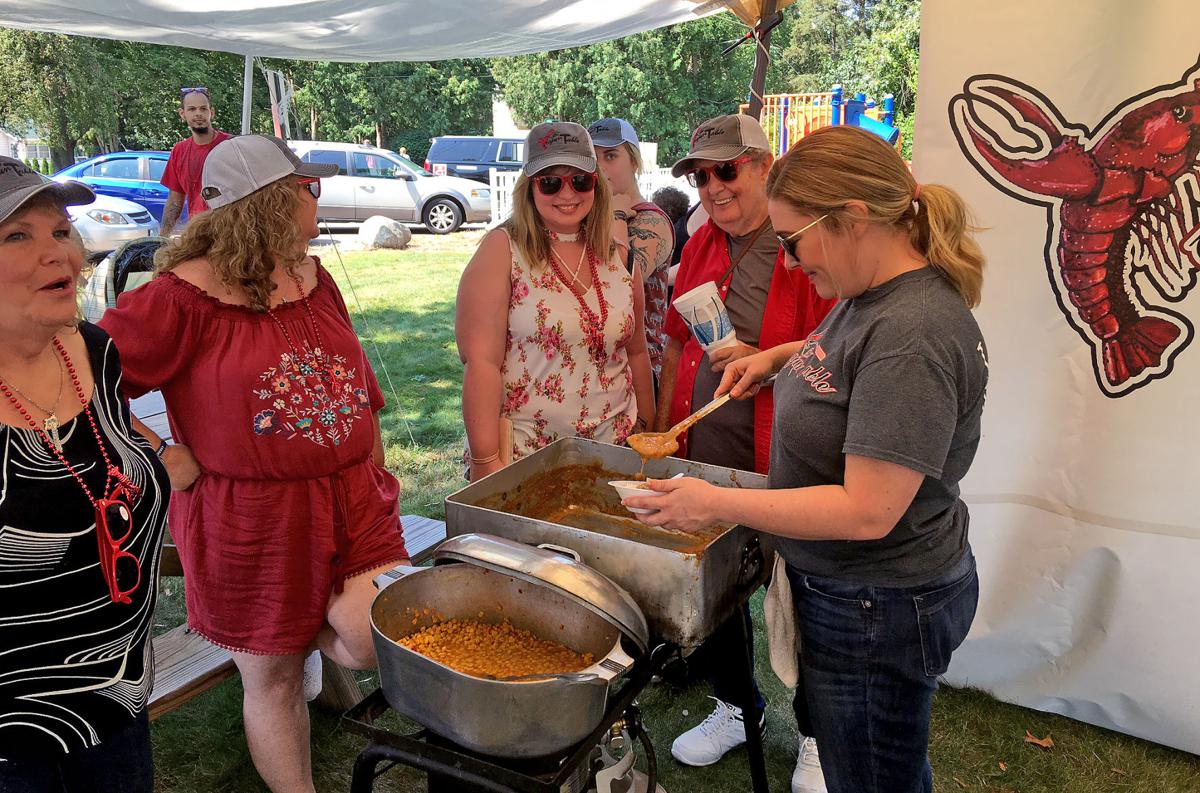Lafayette crew brings Cajun culture spice to Michigan village