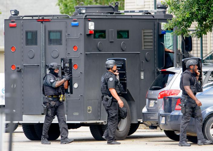 New Orleans Police officer fired at man who pointed weapon at her in ...