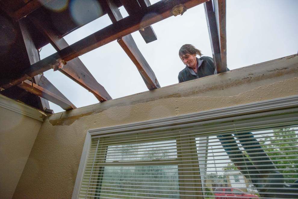 Falling trains, a collapsed house, a torn-off roof and affected flights: New Orleans’ stormy Monday _lowres