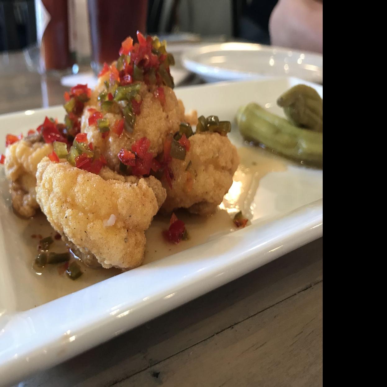 Review Eliza A New Restaurant In Jam Packed Food Stretch Along