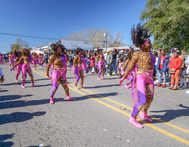 Carnival returns to Clinton as Mardi Gras parade rolls through town