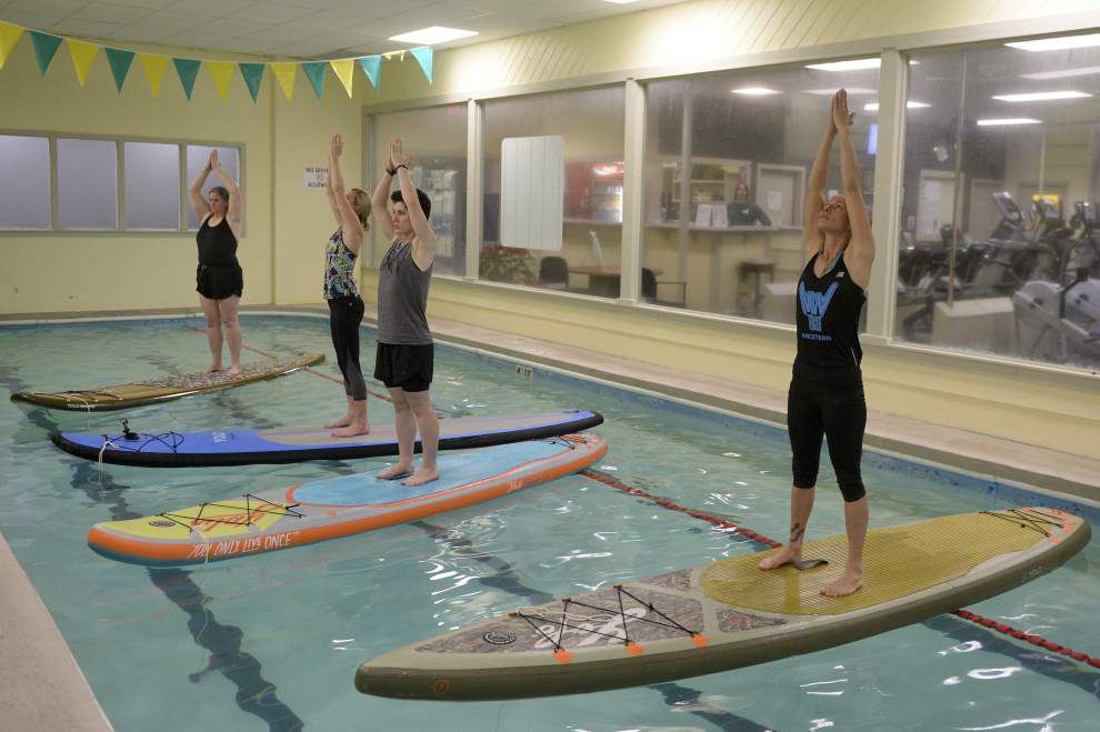 Match Made in Heaven: Stand-up Paddle Boarding + Yoga = SUP Yoga