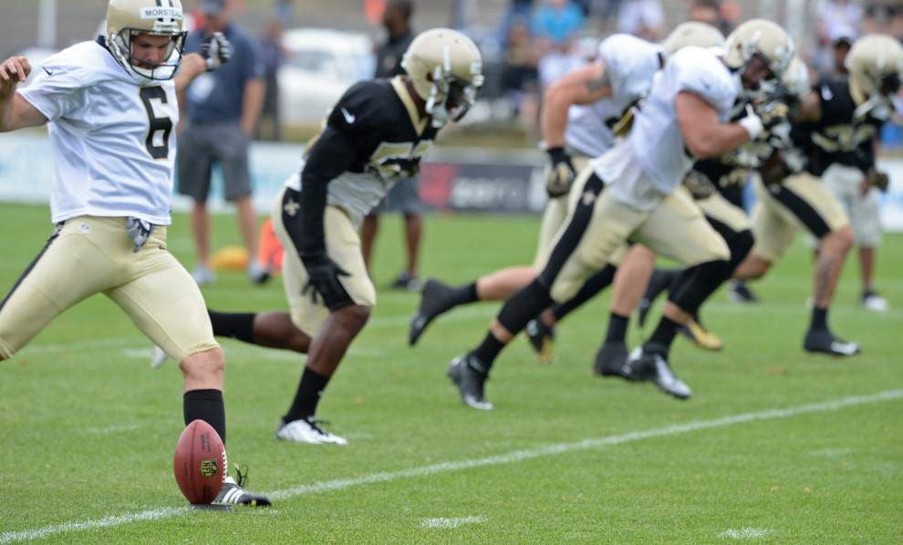 Brees in pads again but is still limited _lowres