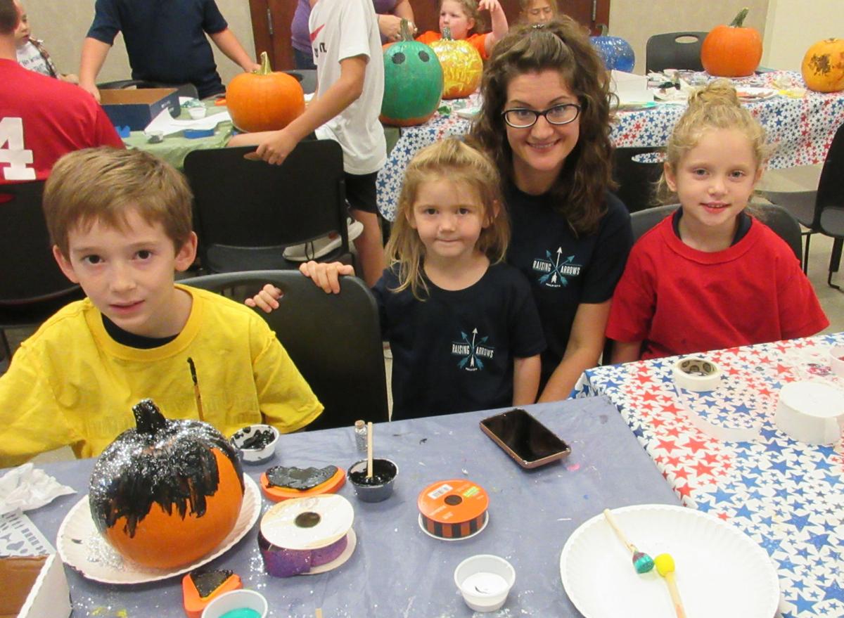 Children decorate pumpkins at Albany-Springfield Branch of ...