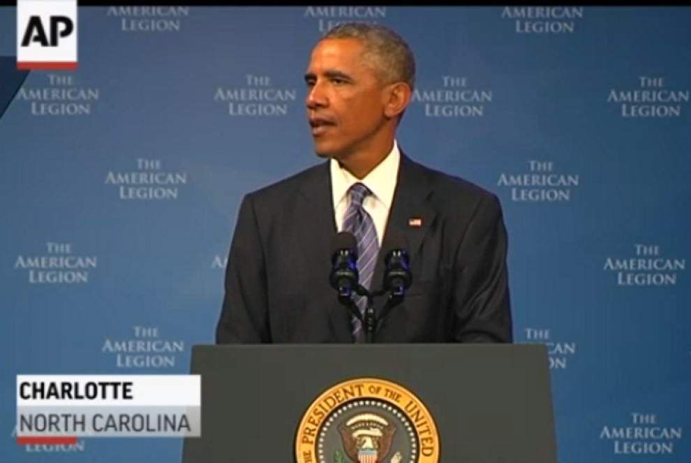 Obama vows justice in murder of American _lowres