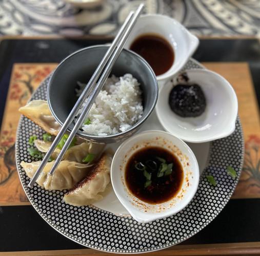 At The Table 4.14.24 plated gyoza with dipping sauces.jpg
