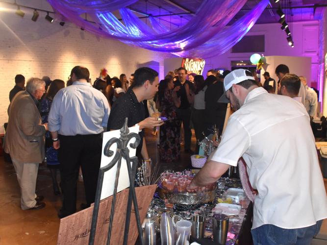 Bartenders show off skills to raise money for Hammond Regional Arts ...
