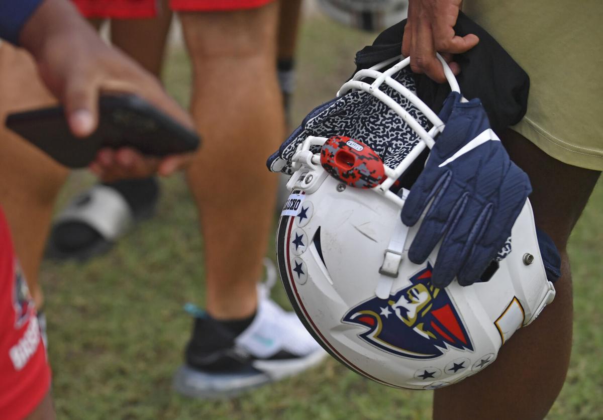 Game on: As first football varsity season looms, Liberty players eager