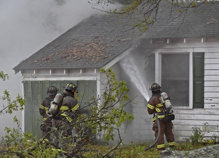 House catches fire from downed power line caused by heavy winds, fire
