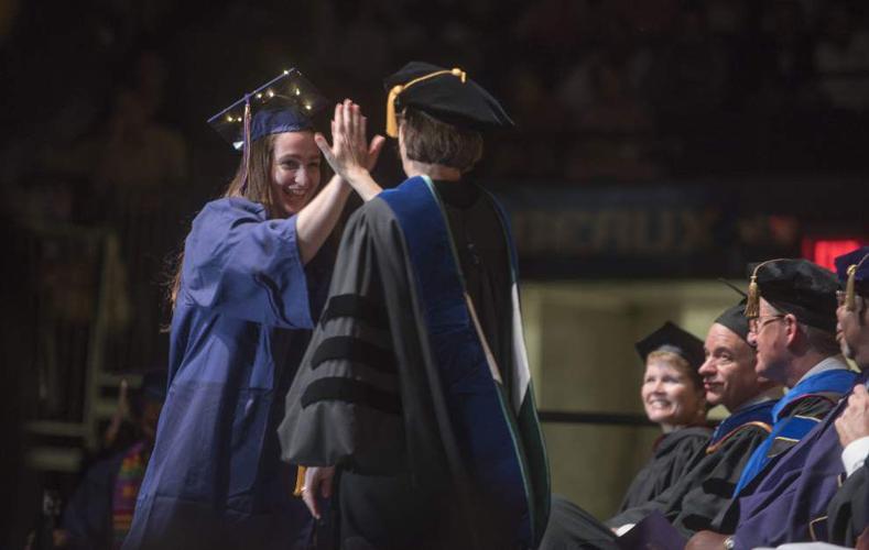 Photos Summer heat doesn't stop these LSU graduates from donning their