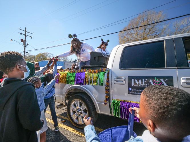 Carnival returns to Clinton as Mardi Gras parade rolls through town