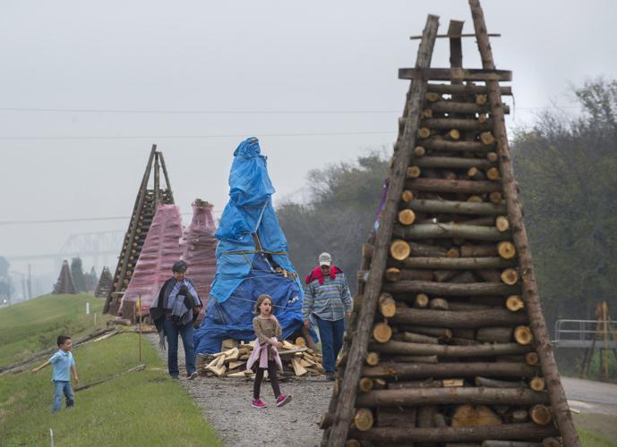 Bonfire builders put on final touches for St. James Parish tradition on ...