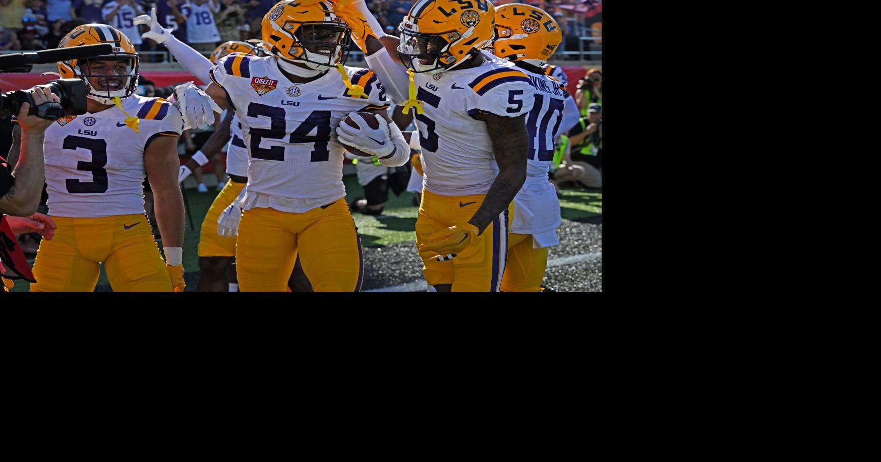 WATCH LSU players laid down in the CheezIt bed after a big play. A
