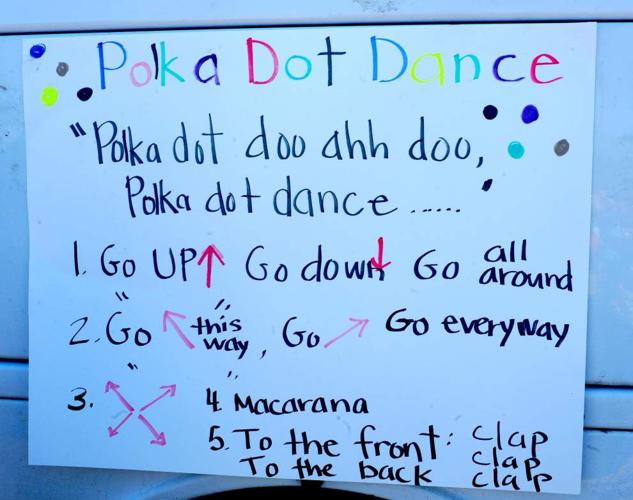 Polka dot dancing, singing Zachary