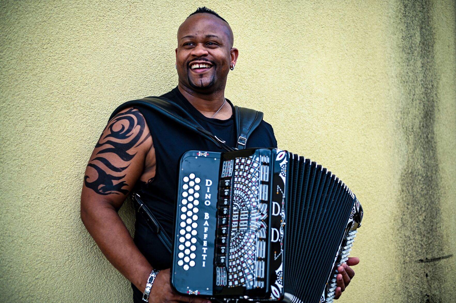 Louisiana musician Dwayne Dopsie plays with Rolling Stones