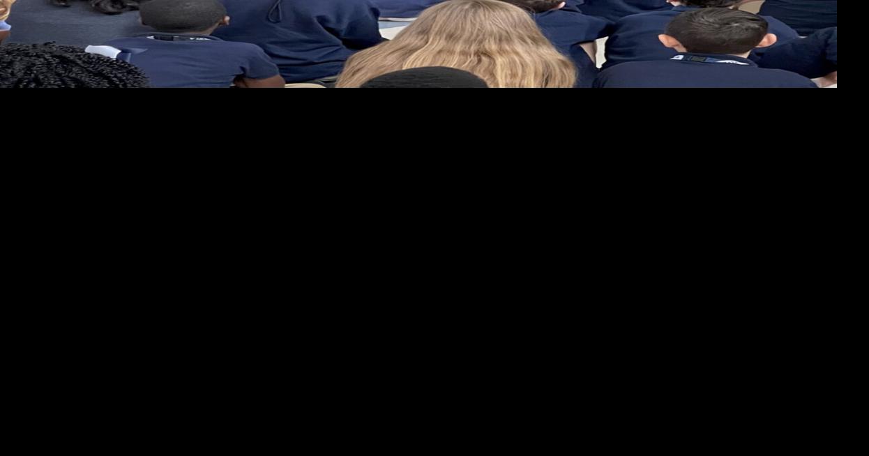 Jay Grymes visits third graders at Zachary Elementary School Zachary