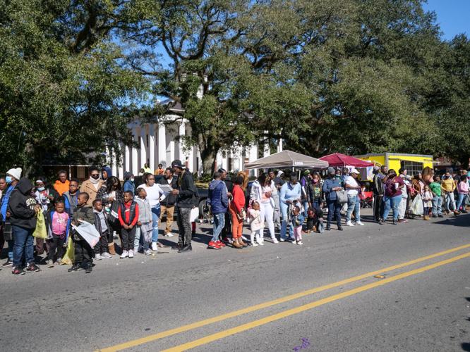 Carnival returns to Clinton as Mardi Gras parade rolls through town