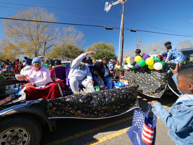 Carnival returns to Clinton as Mardi Gras parade rolls through town