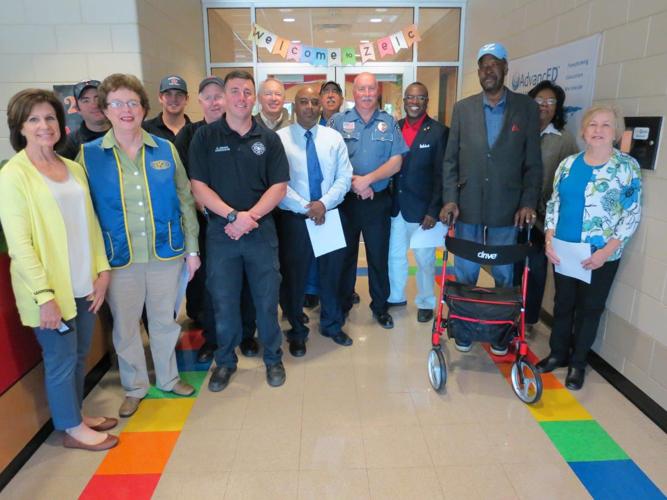 Kiwanis, community helpers read to Zachary students Zachary