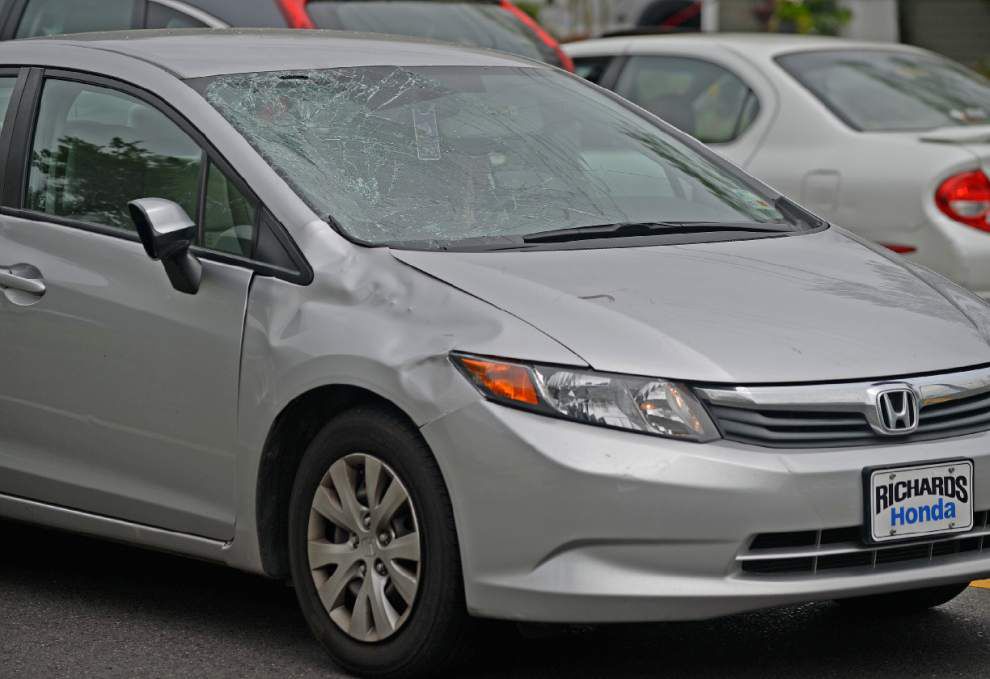 Video, photos: Car strikes woman on bicycle Tuesday on Stanford Avenue _lowres
