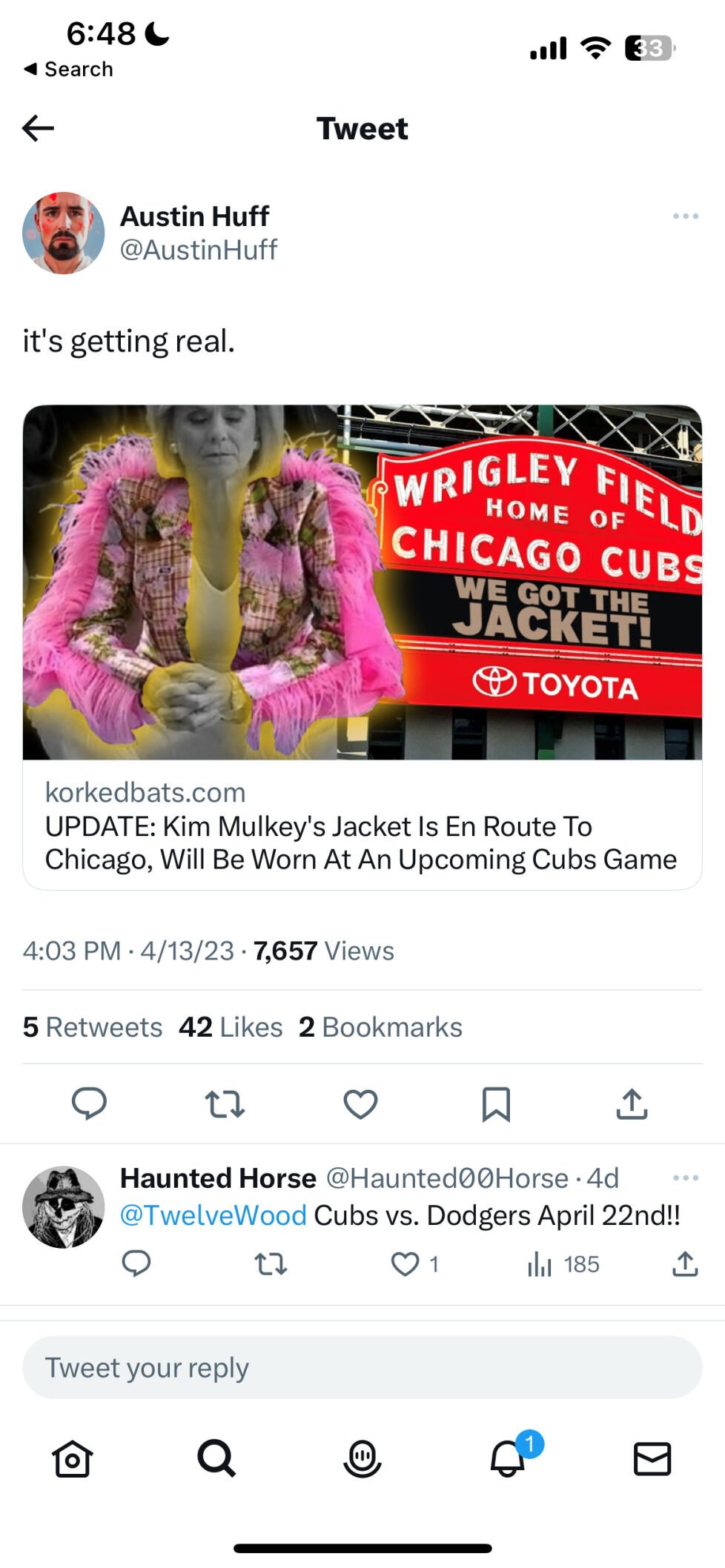 Cubs fan wears Kim Mulkey's feathered jacket to game at Wrigely Field