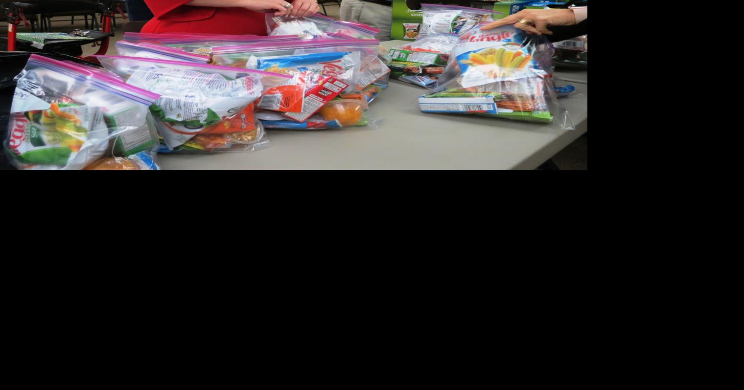 Zachary Rotary works on snack pack project for Zachary Charity League ...