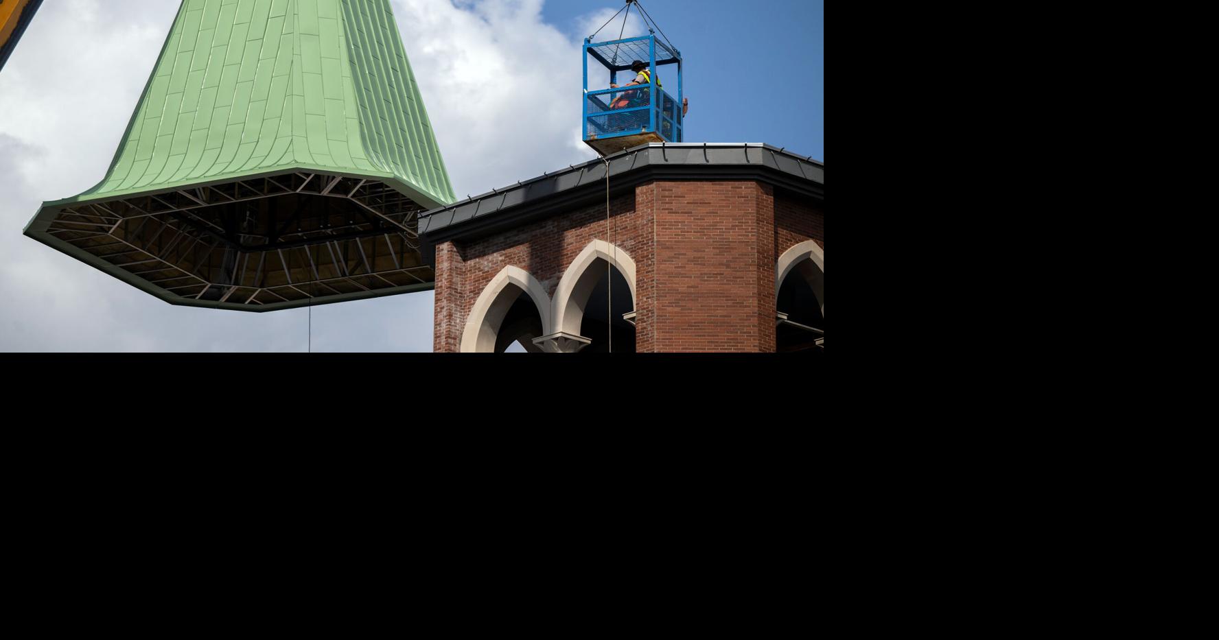 Photos: Steeple hoisted onto new Our Lady of Wisdom Catholic Church