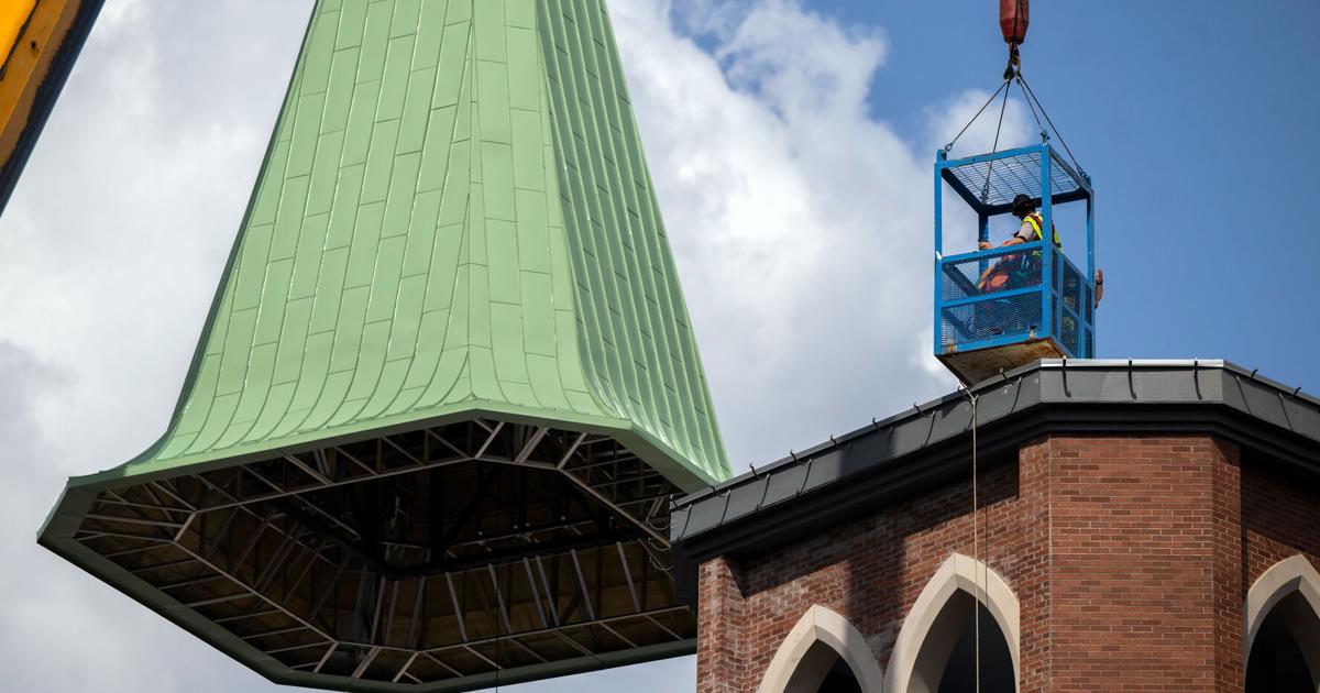 Photos: Steeple hoisted onto new Our Lady of Wisdom Catholic Church