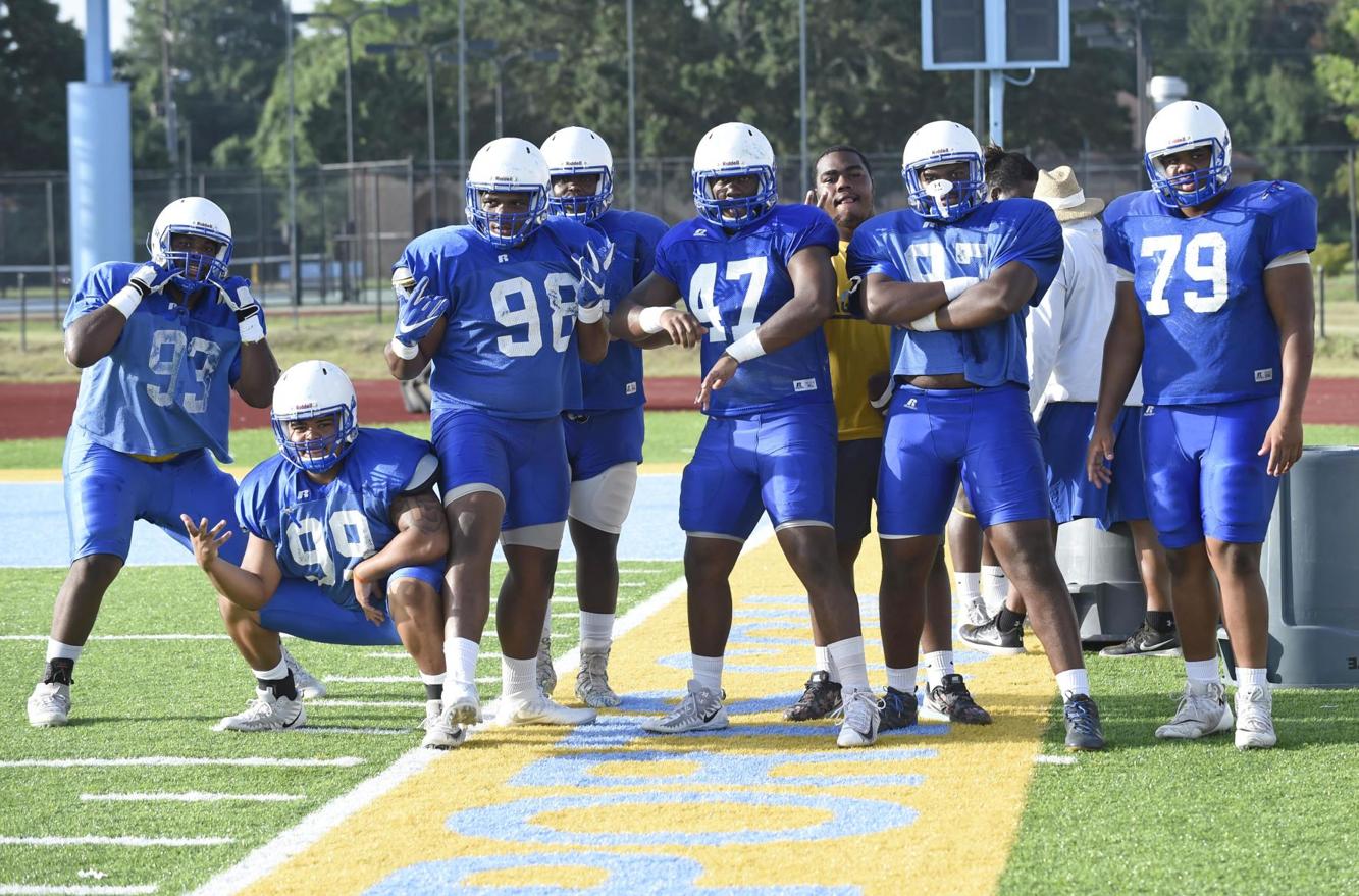 Photos Southern University football team beats the heat with early