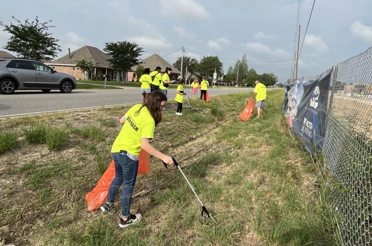 Litter warriors pick up trash along roadside and in parish parks during
