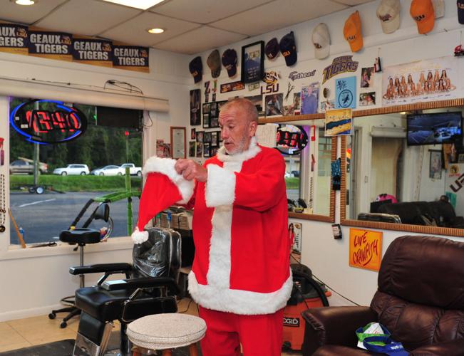 From a Santa suit to a flamingo floatie, this Denham Springs barber