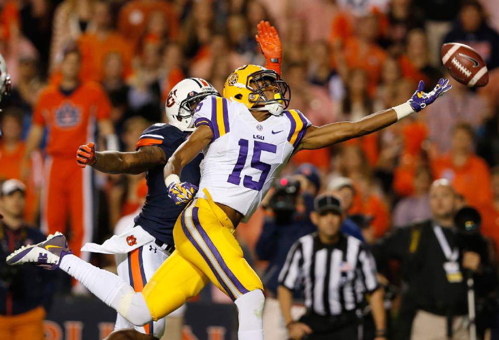 ‘That’s how we are’: LSU’s Malachi Dupre, Brandon Harris and friends assist motorists stuck in Burbank flood waters Sunday _lowres
