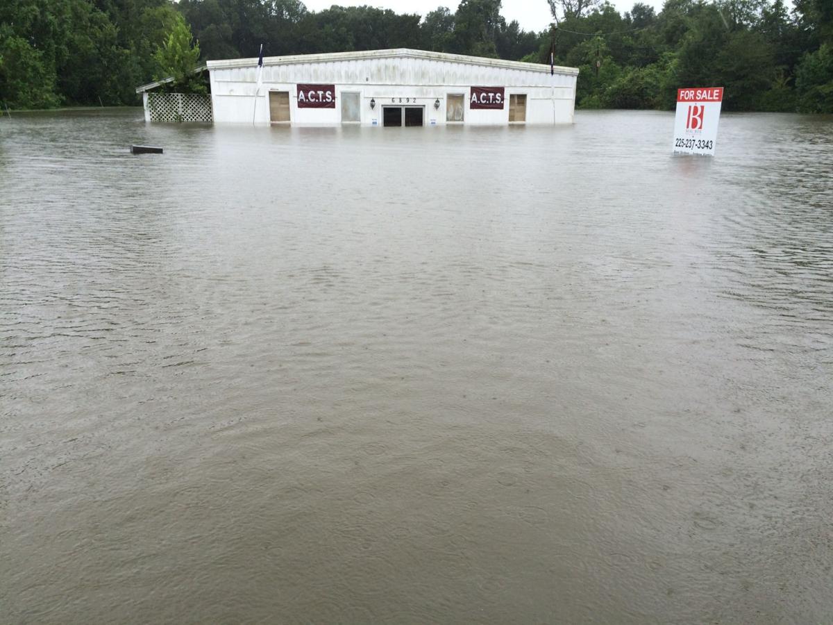 In Central, hundreds await rescue in floods; on Hooper Road flood