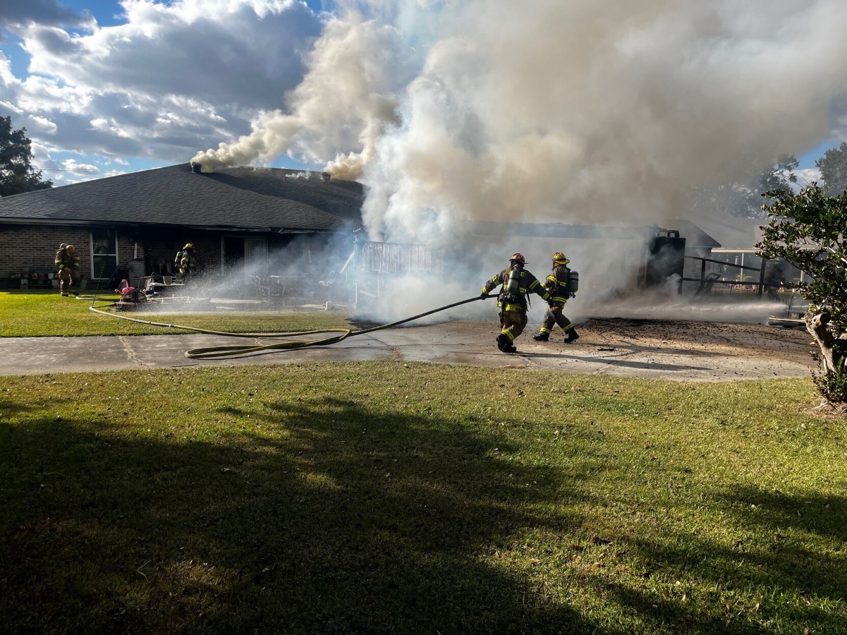 Three people escape Lafayette house fire that damaged two homes