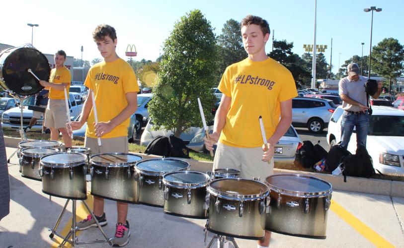 Raising Cane's in Denham Springs reopens after flooding, donates 1K to