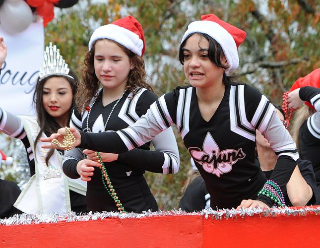 Bands, floats, horses join Santa for Walker Christmas parade