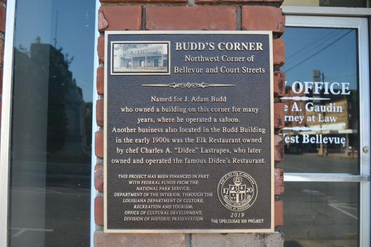 Plaques on street corners around Opelousas courthouse tell stories of