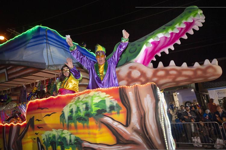 Photos Krewe of Comogo Mardi Gras parade rolls Sunday night in