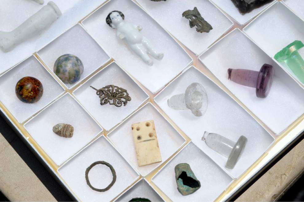 Gallery: Plantation dig unearths centuries old artifacts _lowres