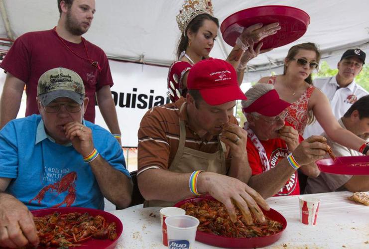 Photos Breaux Bridge Crawfish Festival goers chow down on some mudbugs